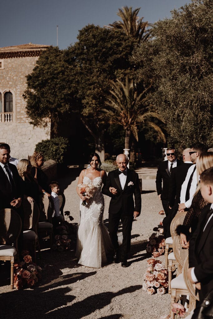 Bride-walking-down-the-aisle-at-mallorca-wedding-at-son-marroig